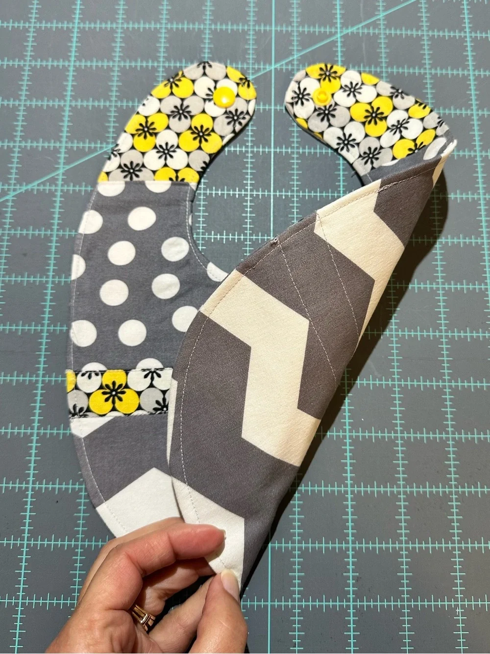 Gray Chevron Baby Bib and Diaper Pouch with Yellow Floral Accent
